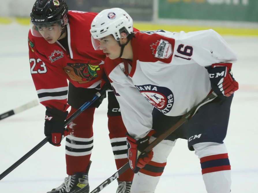 Forwards Zach Biniaris (left) of Brockville and Antoine Gauthier of Ottawa await a faceoff during the opener of the Braves-Jr. Senators home-and-home on Friday, Oct. 14, 2022. Brockville won 2-1 in overtime; Ottawa won the closer 5-2 on Saturday. Tim Ruhnke/The Recorder and Times